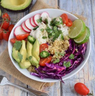 Fish Taco Grain Bowl in white bowl with avocado
