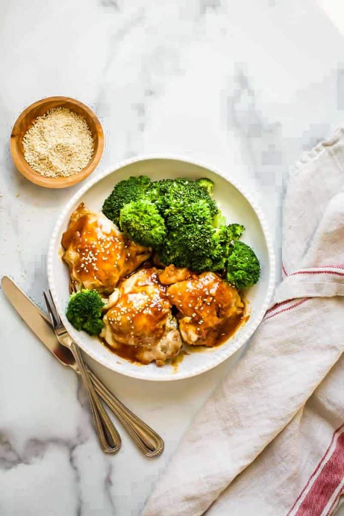 instant pot teriyaki chicken with broccoli on a white plate